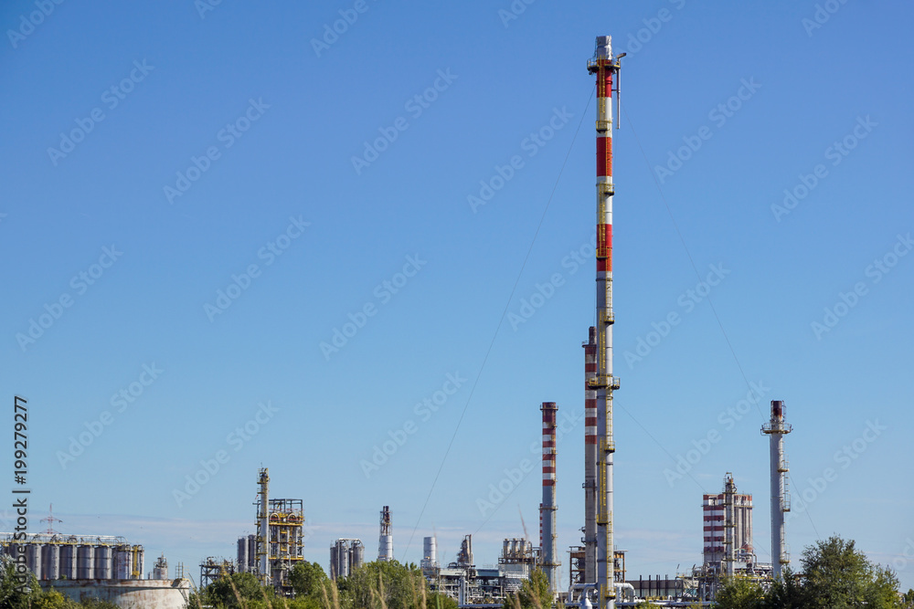 Obraz premium Industrial power plant with blue sky background