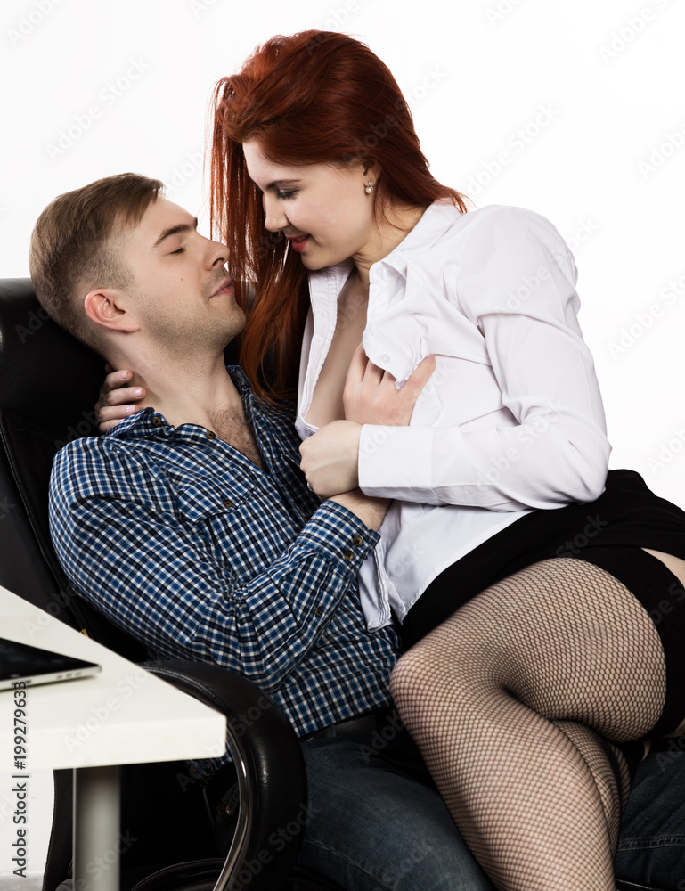 young sexy secretary is sexually harassing to her boss. love affair at work  foto de Stock | Adobe Stock