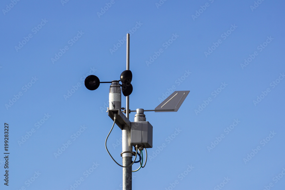 Devices meteorological station on the blue background of the sky Devices meteorological station on the blue background of the sky