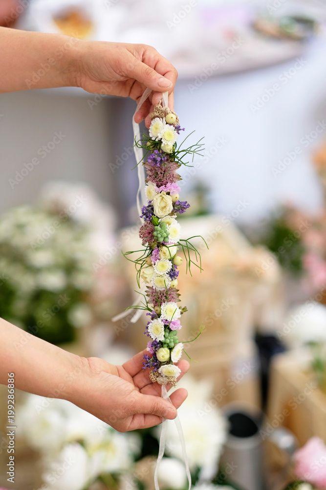 Bridal accessories. Flowers belt accessories for bride at wedding event. Stock Photo Adobe Stock