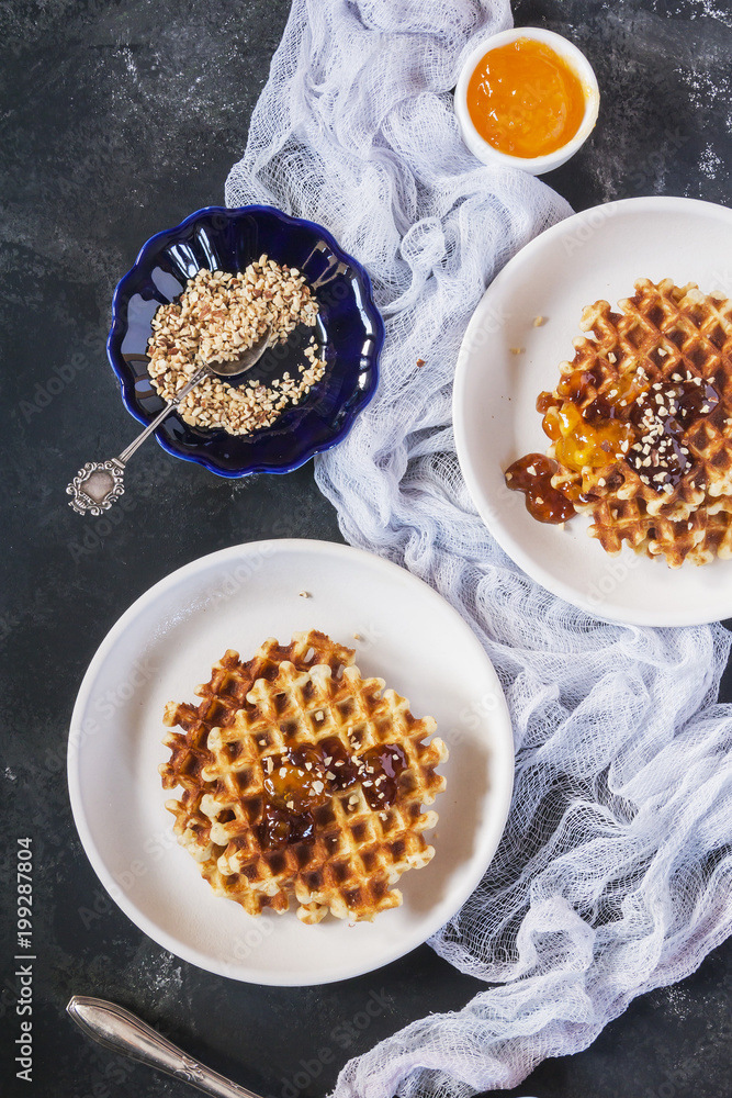Bright and cozy Breakfast. Toast with butter and jam, pate. Family, happiness, joy, Easter holiday. top view. Close up. Vertical. Selective focus. Bright and cozy Breakfast. Toast with butter and jam, pate. Family, happiness, joy, Easter holiday. top view. Close up. Vertical. Selective focus.