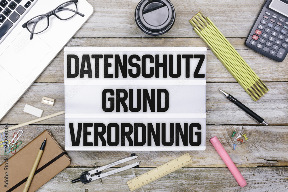 German General Data Protection Regulation (DSGVO) new law in 2018, lightbox office flat lay German General Data Protection Regulation (DSGVO) new law in 2018, lightbox office flat lay
