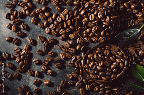 Piles of brown coffee beans in composition