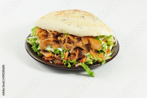 Big sandwich. Sandwich with beef and chicken meat isolated on the white background.