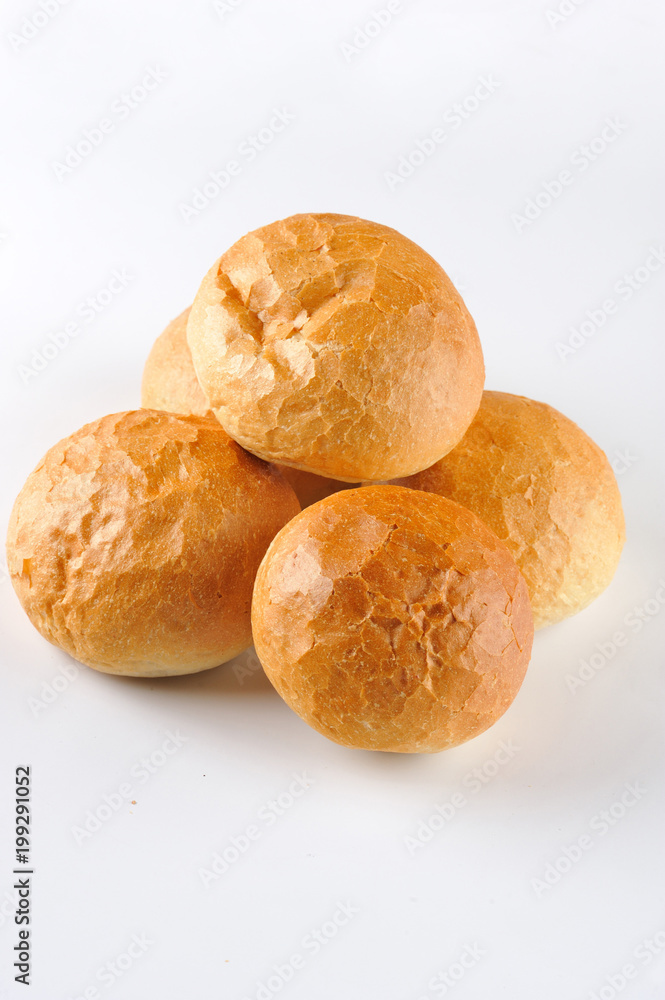 Small loaf of bread. Group of easy dinner rolls isolated on the white background.