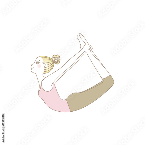 ヨガ　弓のポーズをする若い女性