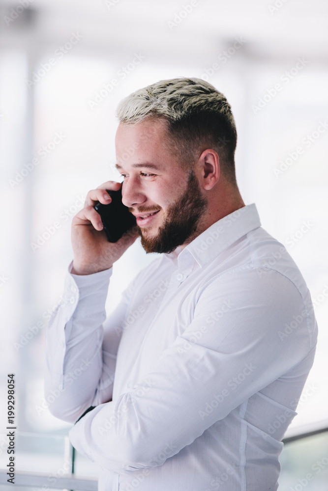 Young Businessman Talking On Phone