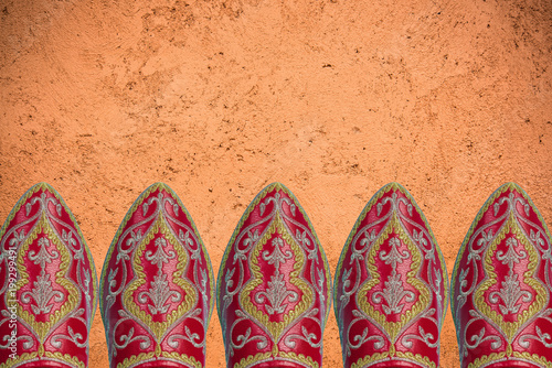 Red oroccan shoes, header background photo