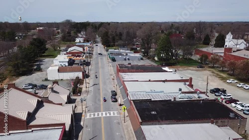 Motorcyles wave in small town USA photo