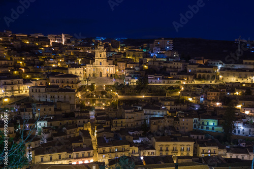 Night view of the illuminated Modica and the imposing San Giorgio cathedral
