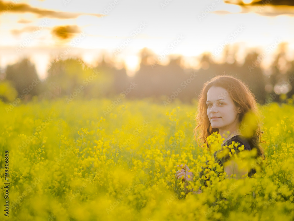 beautiful russian girl in a canola field beautiful russian girl in a canola field