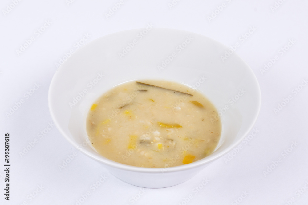 Yeasts soup with vegetables on a white Yeasts soup with vegetables on a white