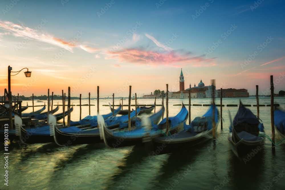 Gondolas in  Grand Canal on sinrise, Venice, Italy