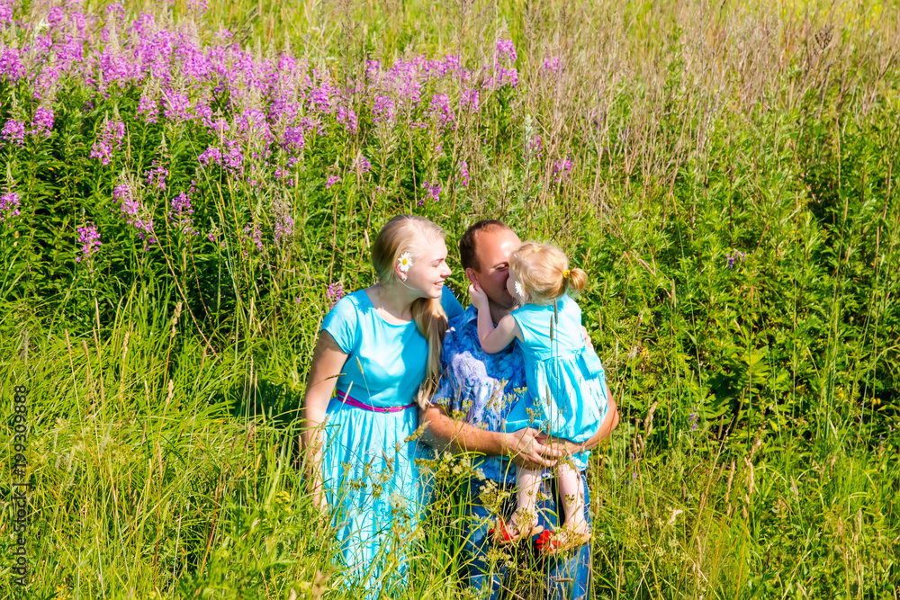 Fototapeta premium young family enjoy summer park fathers day outdoor