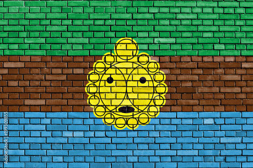 flag of Utuado painted on brick wall photo