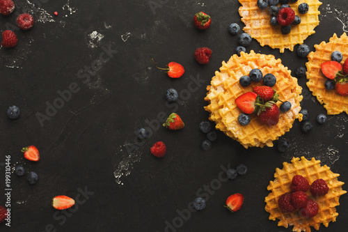 Round belgium waffles with berries