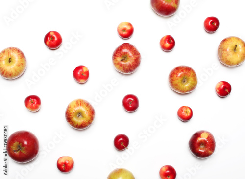 Many apples fruits on a white background