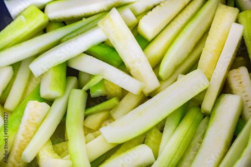 Assortment of zucchini cut into strips in a stove