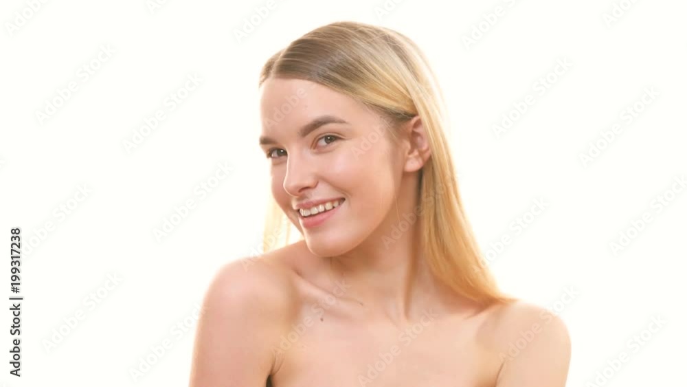 The happy woman posing on the white background The happy woman posing on the white background
