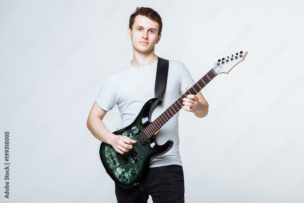 guy with a guitar on a white background