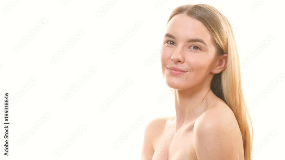 The happy woman posing on the white background The happy woman posing on the white background