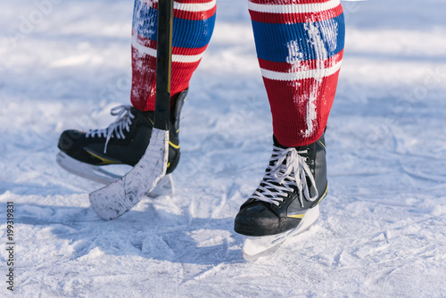 hockey skates close-up during a game on ice