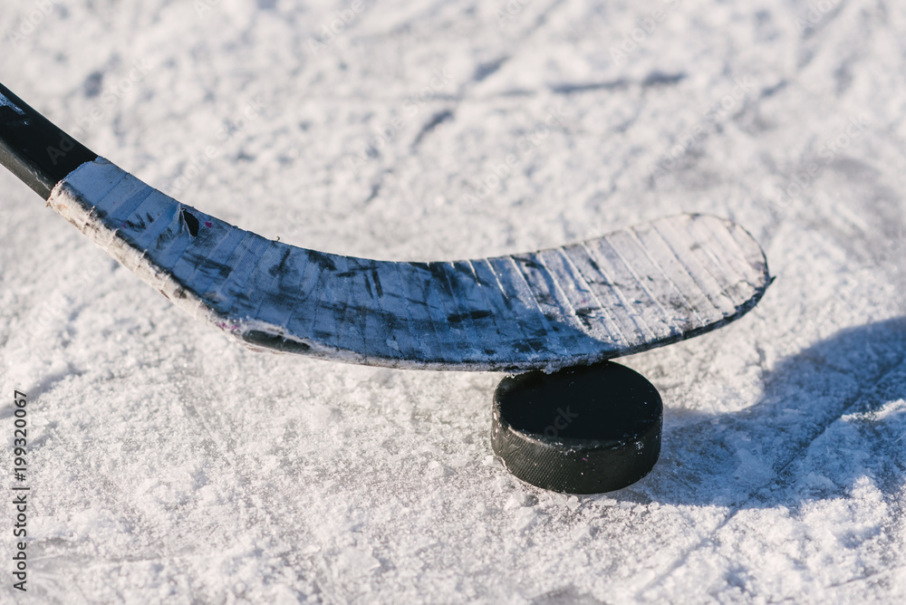 Obraz premium close-up of sticks and pucks in the stadium