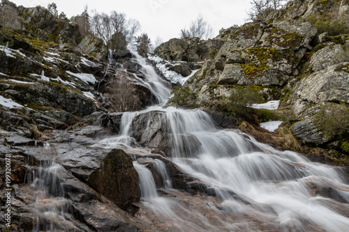 Waterfall from snow melt in the mountains of Madrid, Spain