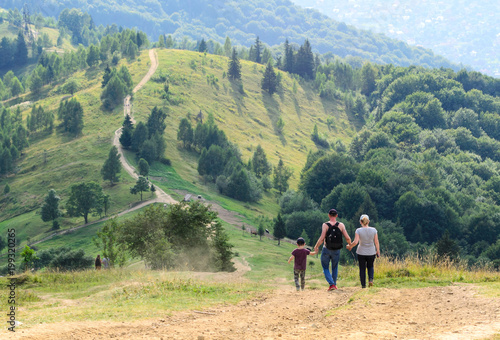 Landscape family travels tourists high up in the mountains