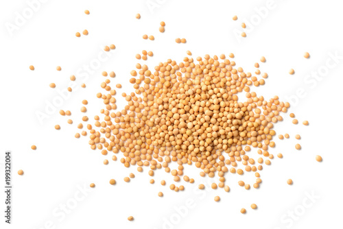 yellow mustard seeds isolated on white, top view