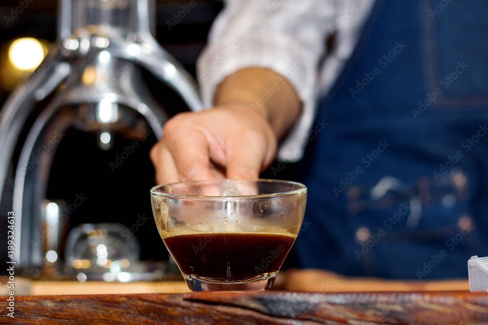 Makeing prepares coffee Makeing prepares coffee