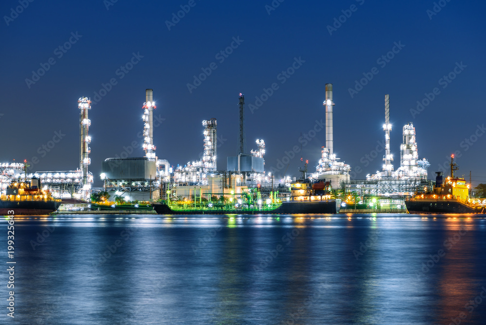 Landscape of oil refinery at night wih Chao Pharaya river in Bangkok Thailand Landscape of oil refinery at night wih Chao Pharaya river in Bangkok Thailand