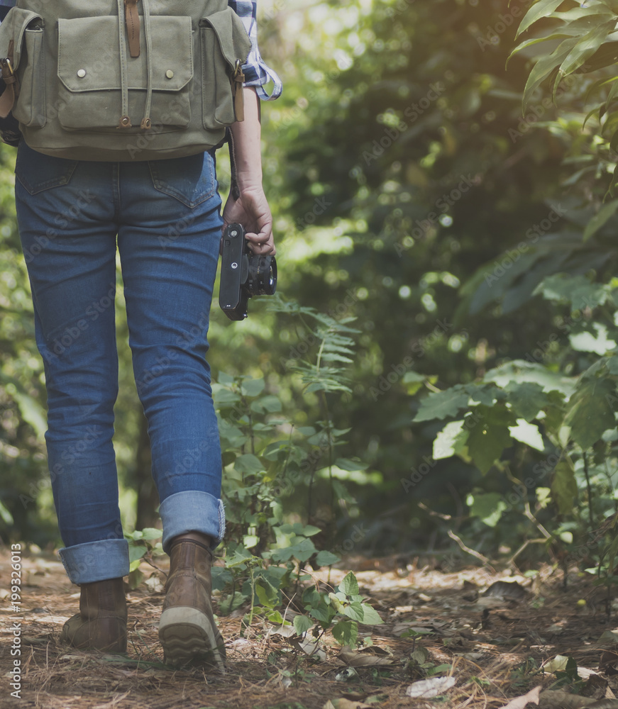 Man hand holding retro photo camera outdoor hipster Lifestyle and backpack travel Man hand holding retro photo camera outdoor hipster Lifestyle and backpack travel