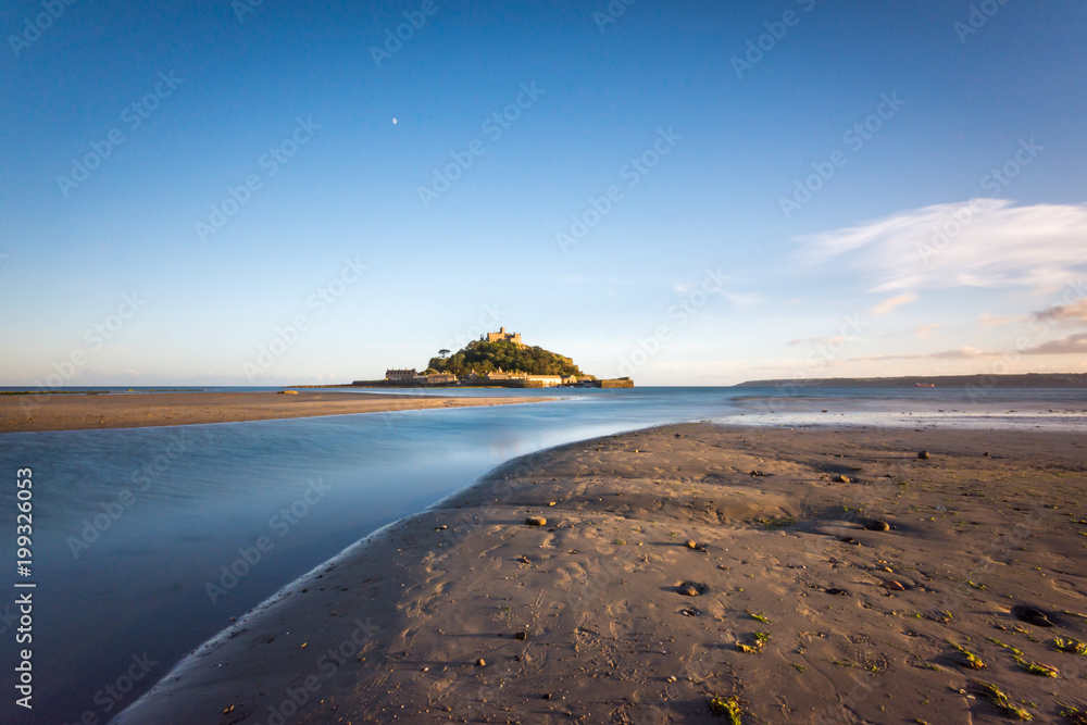 Castle on island at sea viewed from Marazion Beach, Cornwall