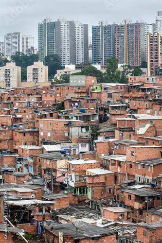 "Paraisopolis" shanty town with high standard buildings in the background. © Imago Photo