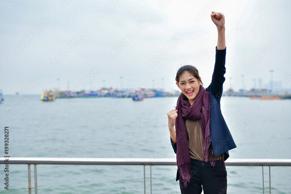 Business concept. Asian businesspeople are happy to succeed. Young businesswoman doing beach activities. Business concept. Asian businesspeople are happy to succeed. Young businesswoman doing beach activities.