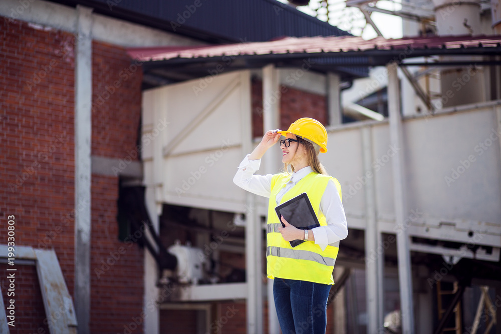 Professional female architect with tablet