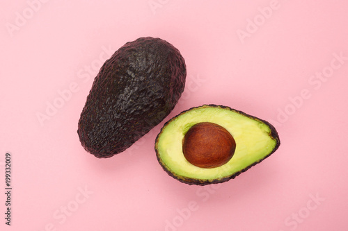 Top view of a ripe sliced avocado isolated