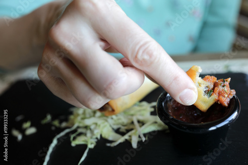 Person eating burritos