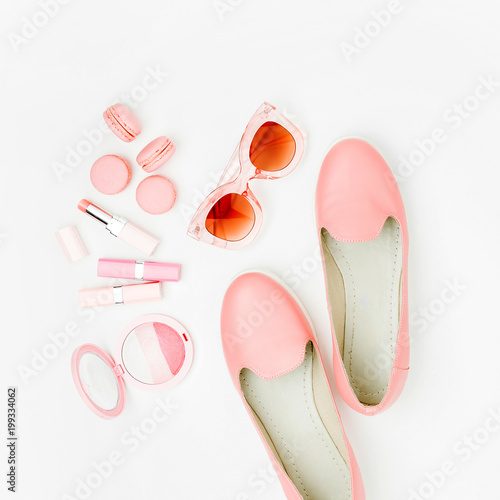 Cosmetic products, sunglass, shoes on white background. Flat lay, top view. Fashion concept