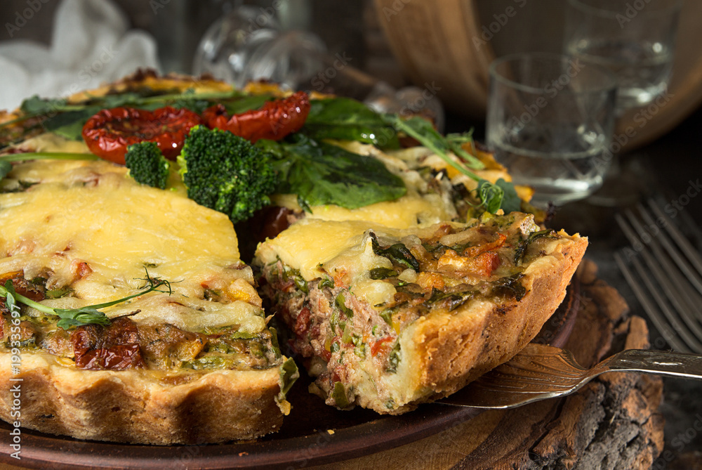 French opened pie quiche with tuna / chicken, broccoli, spinach, pepper, eggs, cheese and dried tomato. French opened pie quiche with tuna / chicken, broccoli, spinach, pepper, eggs, cheese and dried tomato.