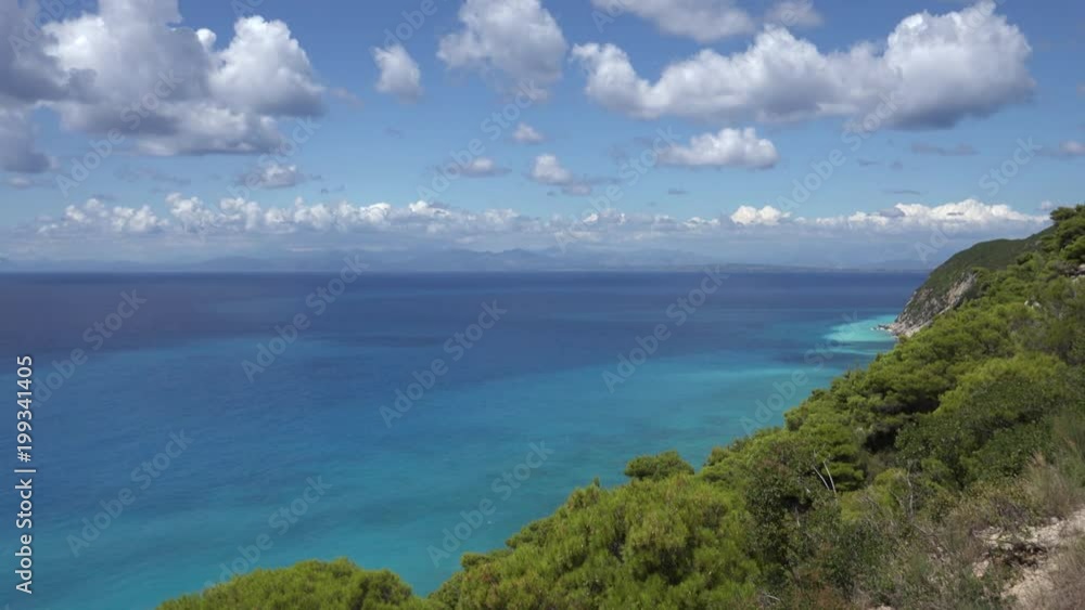 Greece Beach with Blue Waves Crashes on Seashore, Seascape View in Summer 4K Greece Beach with Blue Waves Crashes on Seashore, Seascape View in Summer 4K