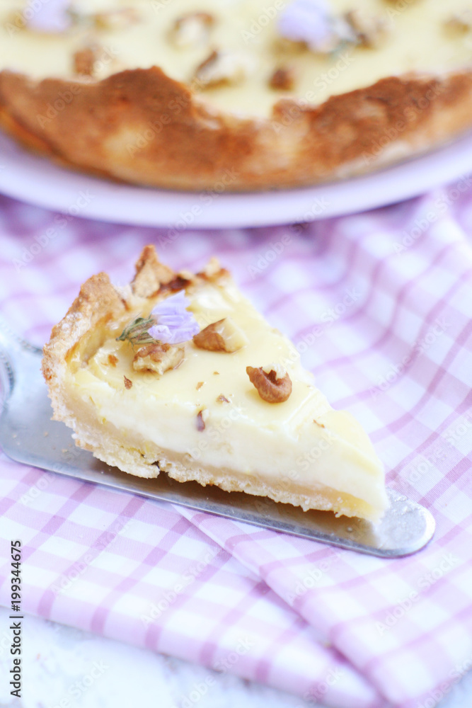 Slice of lemon-pie with nuts Slice of lemon-pie with nuts