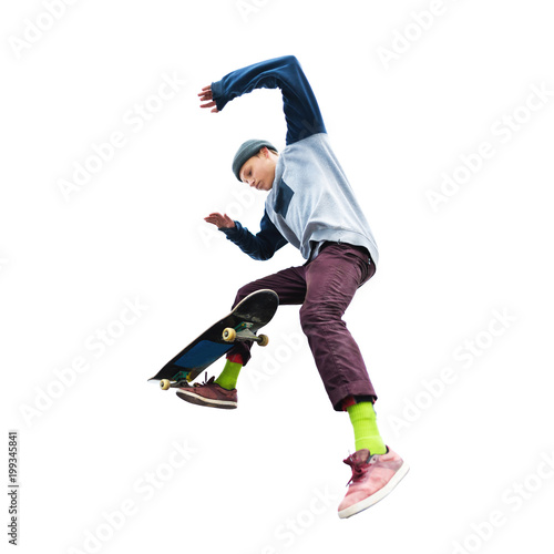 A teenage boy in a hat and a sweatshirt jumping with a skateboard does a trick on an isolated white background. The cut out character the preparation