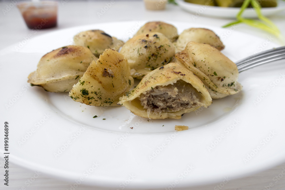 Fried dumplings on a plate. Fried dumplings on a plate.