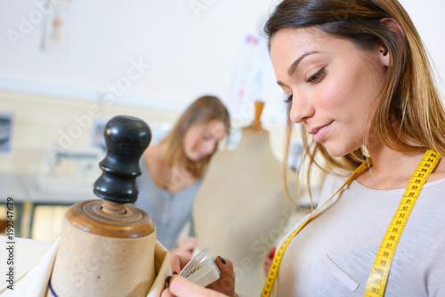 closeup of dressmaker in training class photo