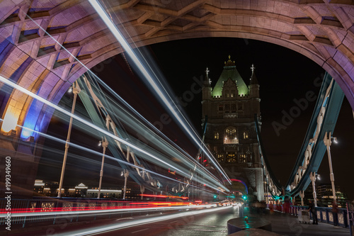 Light trails on Tower bridge at night, London, England