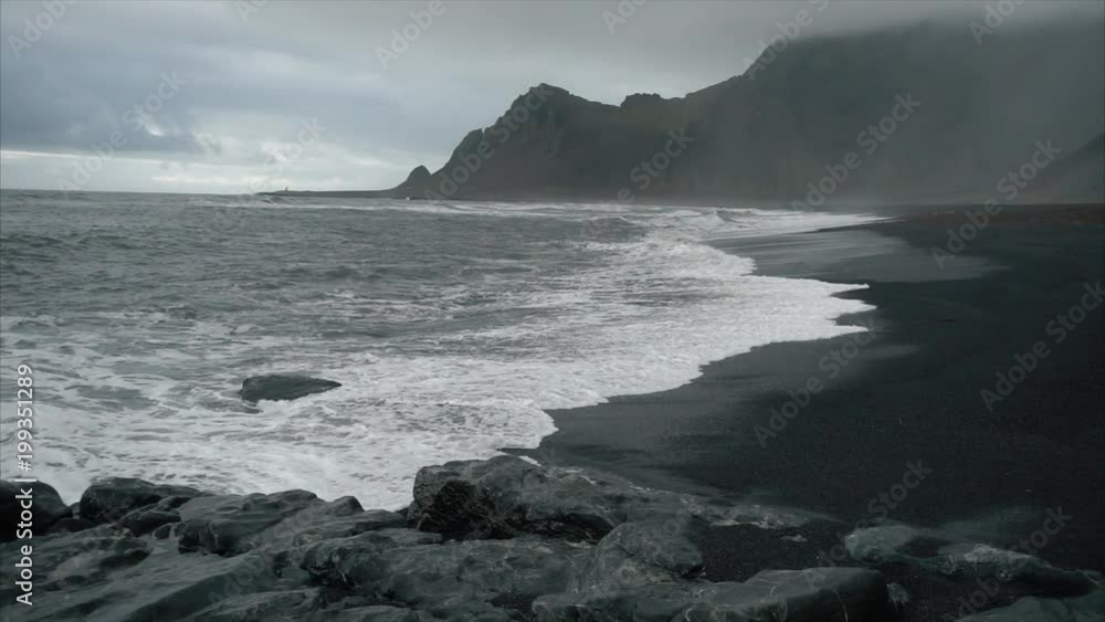 dramatic rocky coastline at dusk dramatic rocky coastline at dusk
