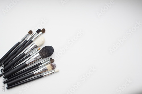 makeup brushes on the white background with free space
