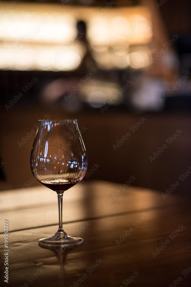 Wine Glass in Tasting Room with Fireplace Wine Glass in Tasting Room with Fireplace